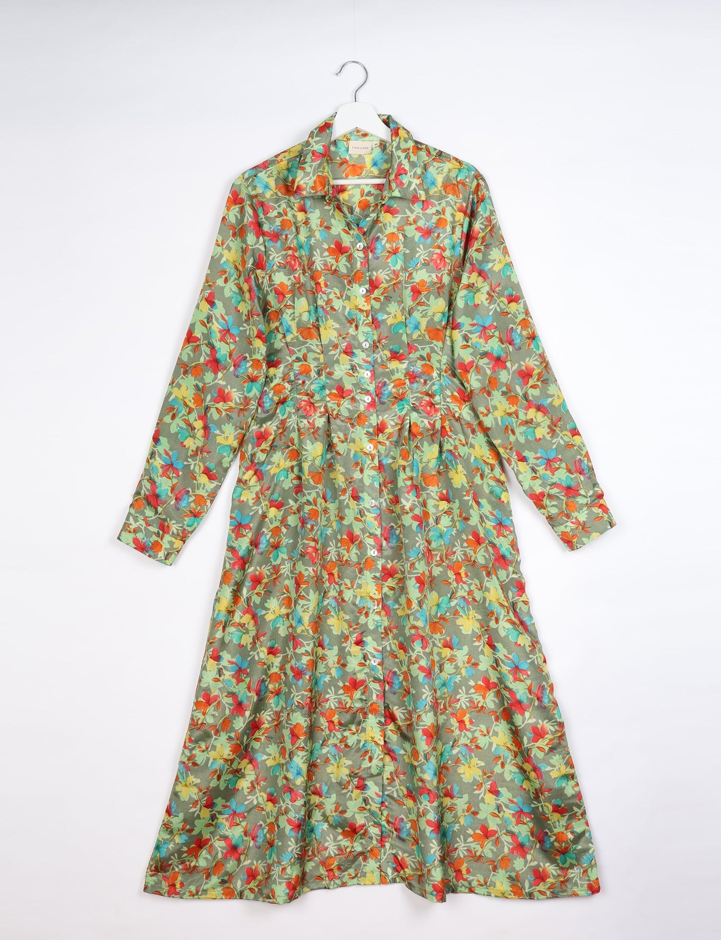 Midi shirt dress with cinched waist, crafted from recycled fabric. A sustainable women's clothing piece representing ethical fashion, eco-friendly products, and upcycled women's clothing.