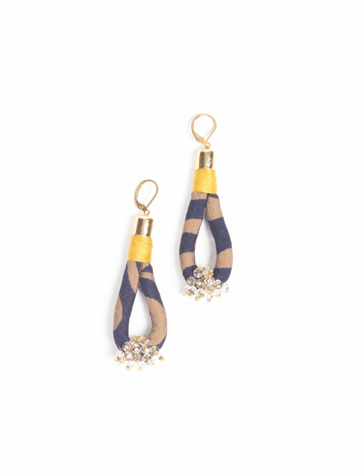 Gold hook drop earrings with blue and beige fabric loops wrapped in yellow thread and clear bead clusters at the bottom