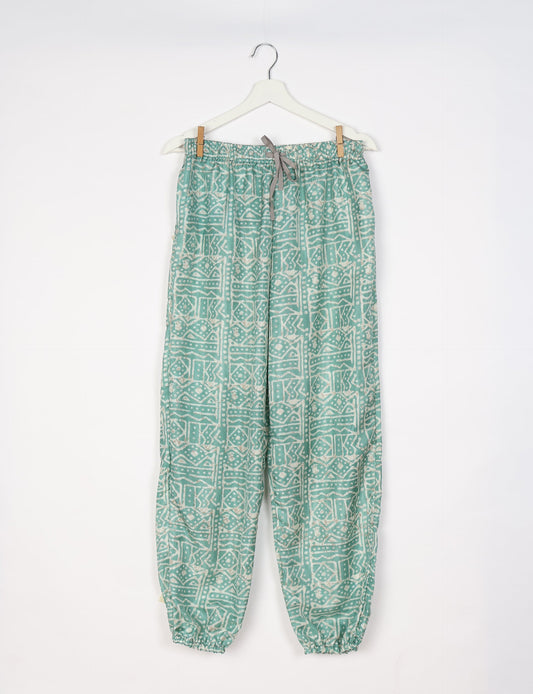 Comfortable and sustainable JOGGER PANTS, pull-on style crafted from eco-materials. Elastic drawstring waist, cotton twill tape, elasticated hems, and slant pockets for style and functionality. Make a positive impact on people and the planet with your fashion choices.
