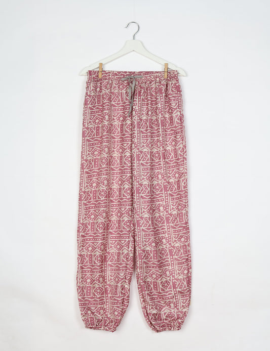 Comfortable and sustainable JOGGER PANTS, pull-on style crafted from eco-materials. Elastic drawstring waist, cotton twill tape, elasticated hems, and slant pockets for style and functionality. Make a positive impact on people and the planet with your fashion choices.