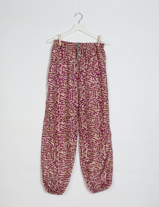 Comfortable and sustainable JOGGER PANTS, pull-on style crafted from eco-materials. Elastic drawstring waist, cotton twill tape, elasticated hems, and slant pockets for style and functionality. Make a positive impact on people and the planet with your fashion choices.