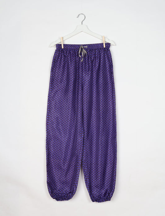 Comfortable and sustainable JOGGER PANTS, pull-on style crafted from eco-materials. Elastic drawstring waist, cotton twill tape, elasticated hems, and slant pockets for style and functionality. Make a positive impact on people and the planet with your fashion choices.