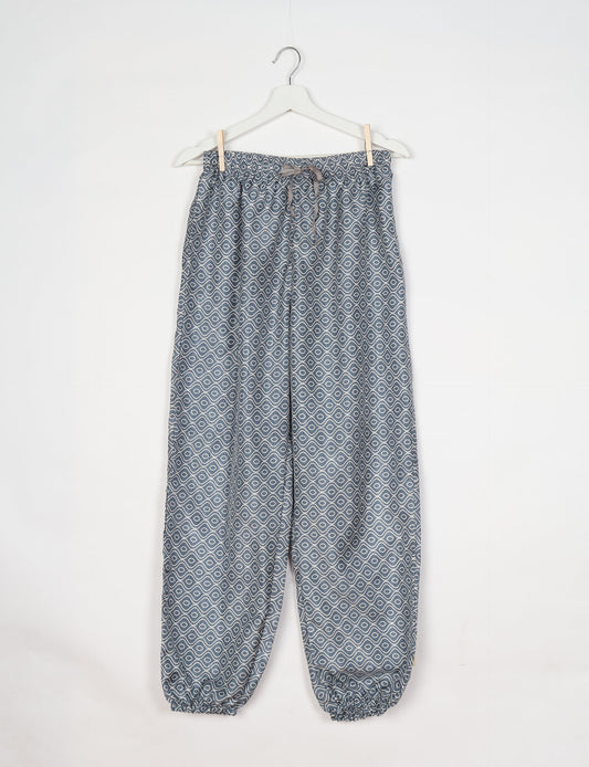 Comfortable and sustainable JOGGER PANTS, pull-on style crafted from eco-materials. Elastic drawstring waist, cotton twill tape, elasticated hems, and slant pockets for style and functionality. Make a positive impact on people and the planet with your fashion choices.