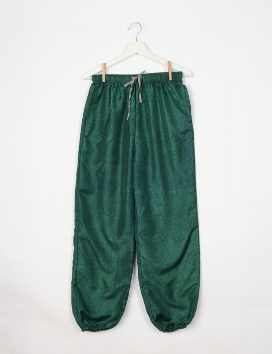 Comfortable and sustainable JOGGER PANTS, pull-on style crafted from eco-materials. Elastic drawstring waist, cotton twill tape, elasticated hems, and slant pockets for style and functionality. Make a positive impact on people and the planet with your fashion choices.