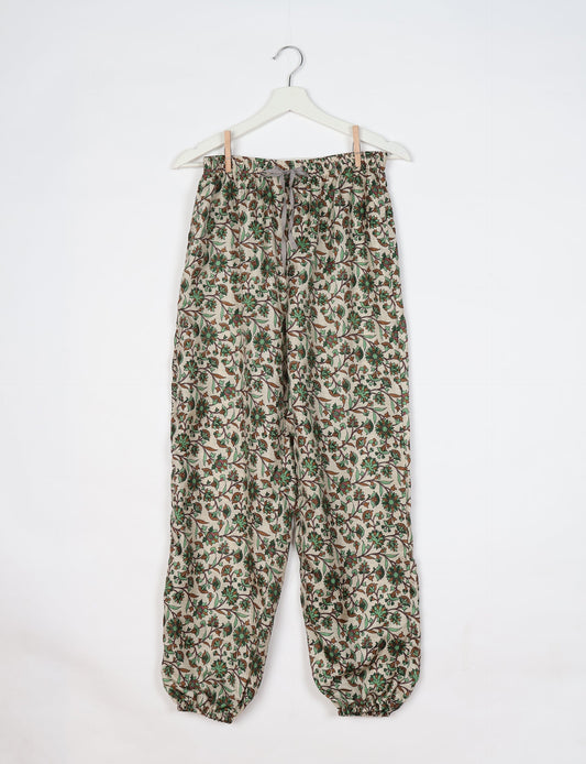 Comfortable and sustainable JOGGER PANTS, pull-on style crafted from eco-materials. Elastic drawstring waist, cotton twill tape, elasticated hems, and slant pockets for style and functionality. Make a positive impact on people and the planet with your fashion choices.