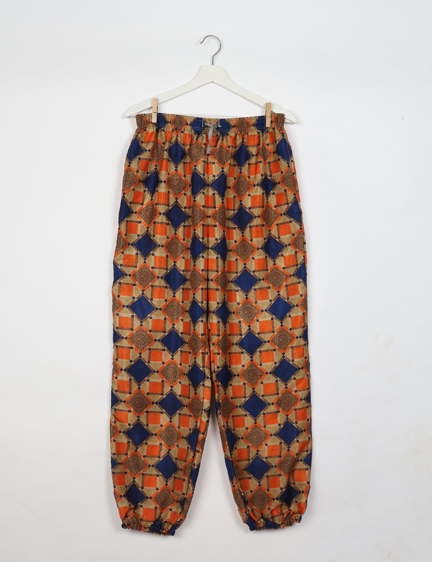Comfortable and sustainable JOGGER PANTS, pull-on style crafted from eco-materials. Elastic drawstring waist, cotton twill tape, elasticated hems, and slant pockets for style and functionality. Make a positive impact on people and the planet with your fashion choices.