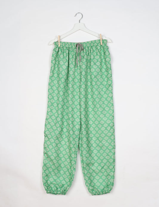 Comfortable and sustainable JOGGER PANTS, pull-on style crafted from eco-materials. Elastic drawstring waist, cotton twill tape, elasticated hems, and slant pockets for style and functionality. Make a positive impact on people and the planet with your fashion choices.