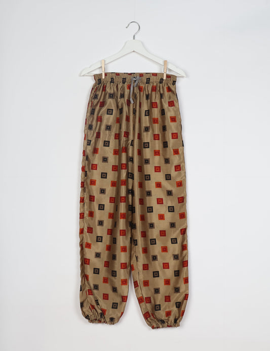 Comfortable and sustainable JOGGER PANTS, pull-on style crafted from eco-materials. Elastic drawstring waist, cotton twill tape, elasticated hems, and slant pockets for style and functionality. Make a positive impact on people and the planet with your fashion choices.