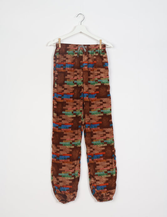 Comfortable and sustainable JOGGER PANTS, pull-on style crafted from eco-materials. Elastic drawstring waist, cotton twill tape, elasticated hems, and slant pockets for style and functionality. Make a positive impact on people and the planet with your fashion choices.