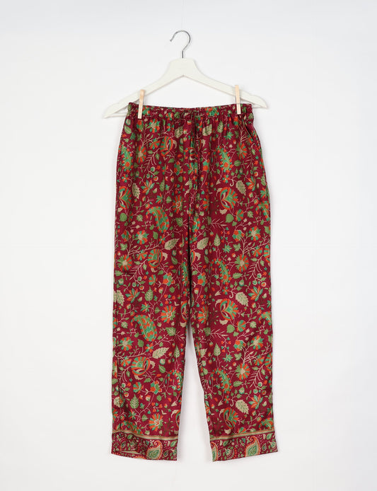 Elevate your wardrobe with our planet-friendly PULL-ON PANTS. Made from upcycled sari fabric, these eco-conscious pants offer a drawstring waist for a perfect fit. Tapered leg design ensures both style and comfort. Choose ethical, green fashion that supports artisans and sustainable living.