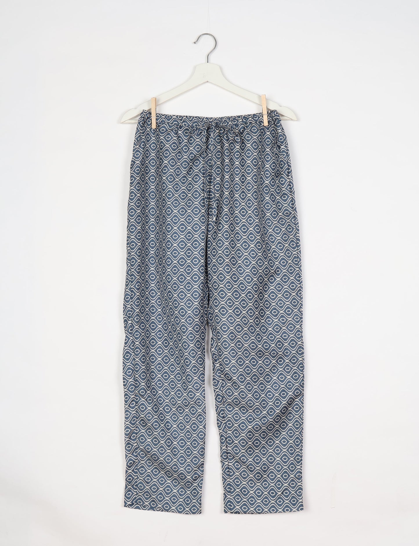 Elevate your wardrobe with our planet-friendly PULL-ON PANTS. Made from upcycled sari fabric, these eco-conscious pants offer a drawstring waist for a perfect fit. Tapered leg design ensures both style and comfort. Choose ethical, green fashion that supports artisans and sustainable living.