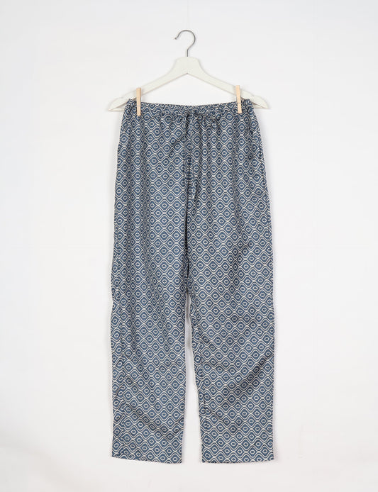 Elevate your wardrobe with our planet-friendly PULL-ON PANTS. Made from upcycled sari fabric, these eco-conscious pants offer a drawstring waist for a perfect fit. Tapered leg design ensures both style and comfort. Choose ethical, green fashion that supports artisans and sustainable living.