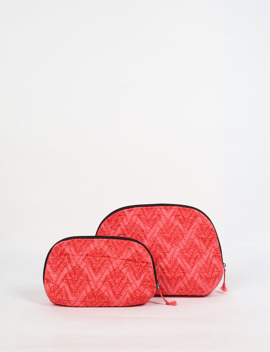 A set of two Vanity Pouches, featuring embellished beaded pullers, made from sustainable materials for eco-conscious travelers.