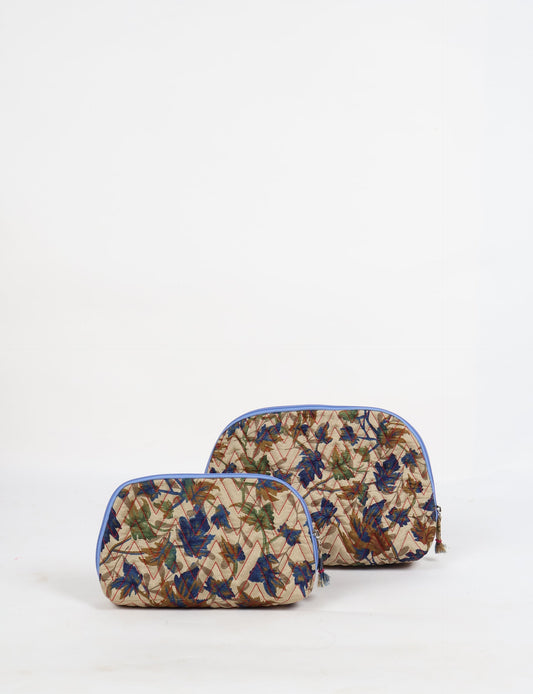 A set of two Vanity Pouches, featuring embellished beaded pullers, made from sustainable materials for eco-conscious travelers.