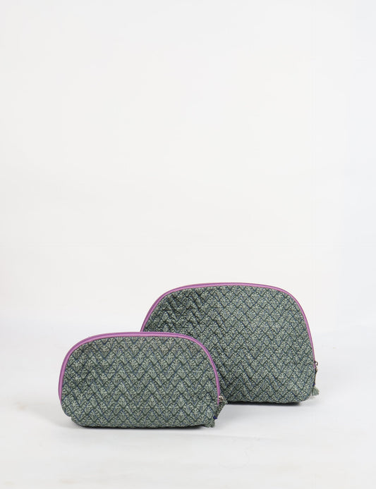 A set of two Vanity Pouches, featuring embellished beaded pullers, made from sustainable materials for eco-conscious travelers.