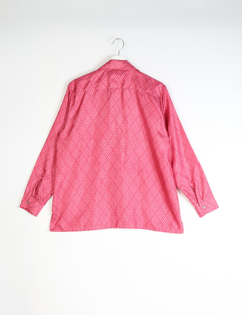 Red tropical patterned long-sleeve resort shirt shown from the back on a white hanger against a white background