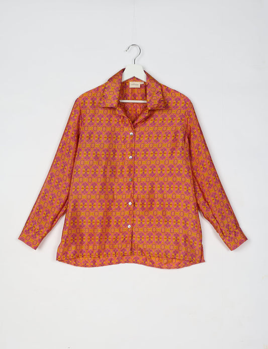 A person wearing a Resort Shirt, a sustainable fashion choice made from recycled materials.