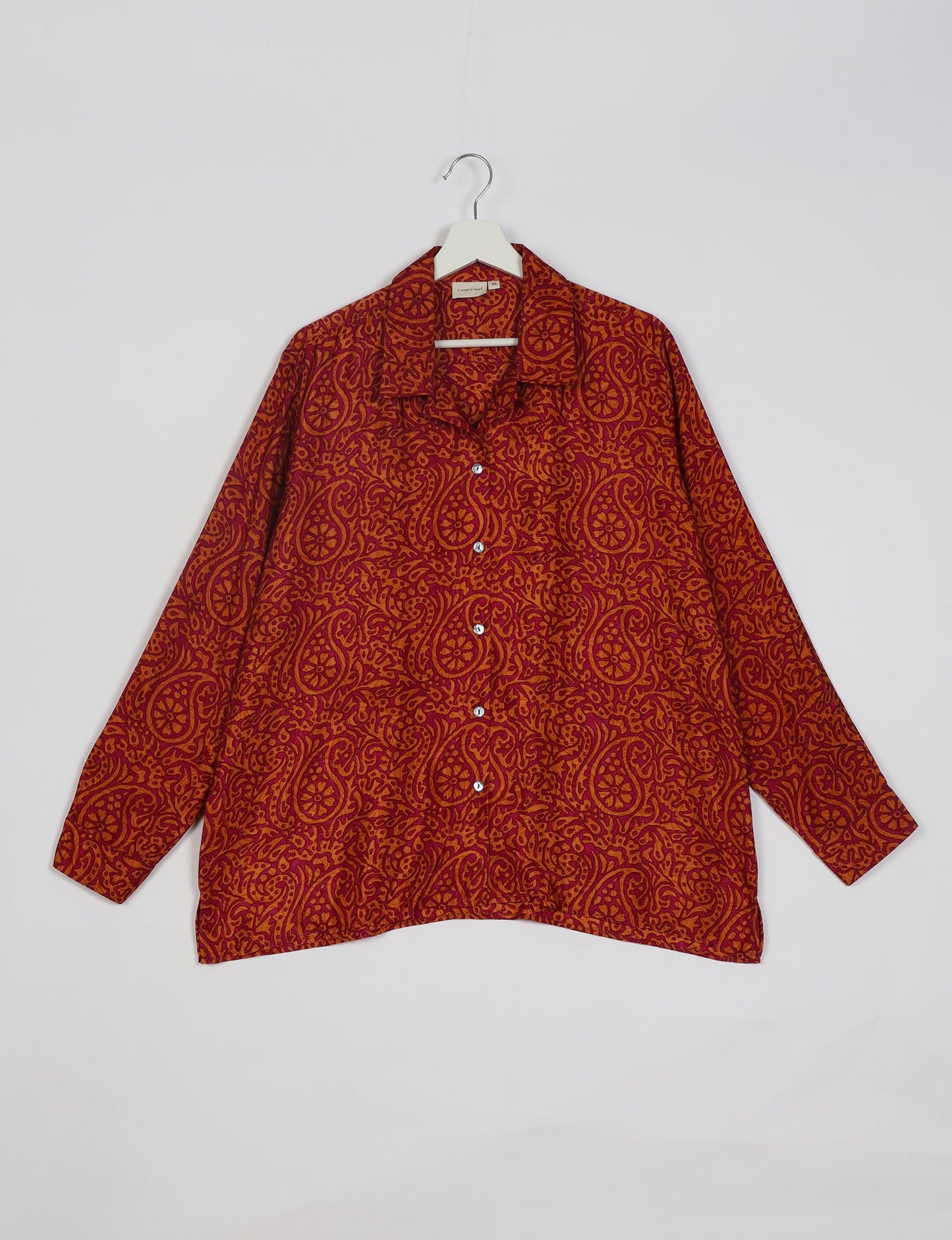 A person wearing a Resort Shirt, a sustainable fashion choice made from recycled materials.