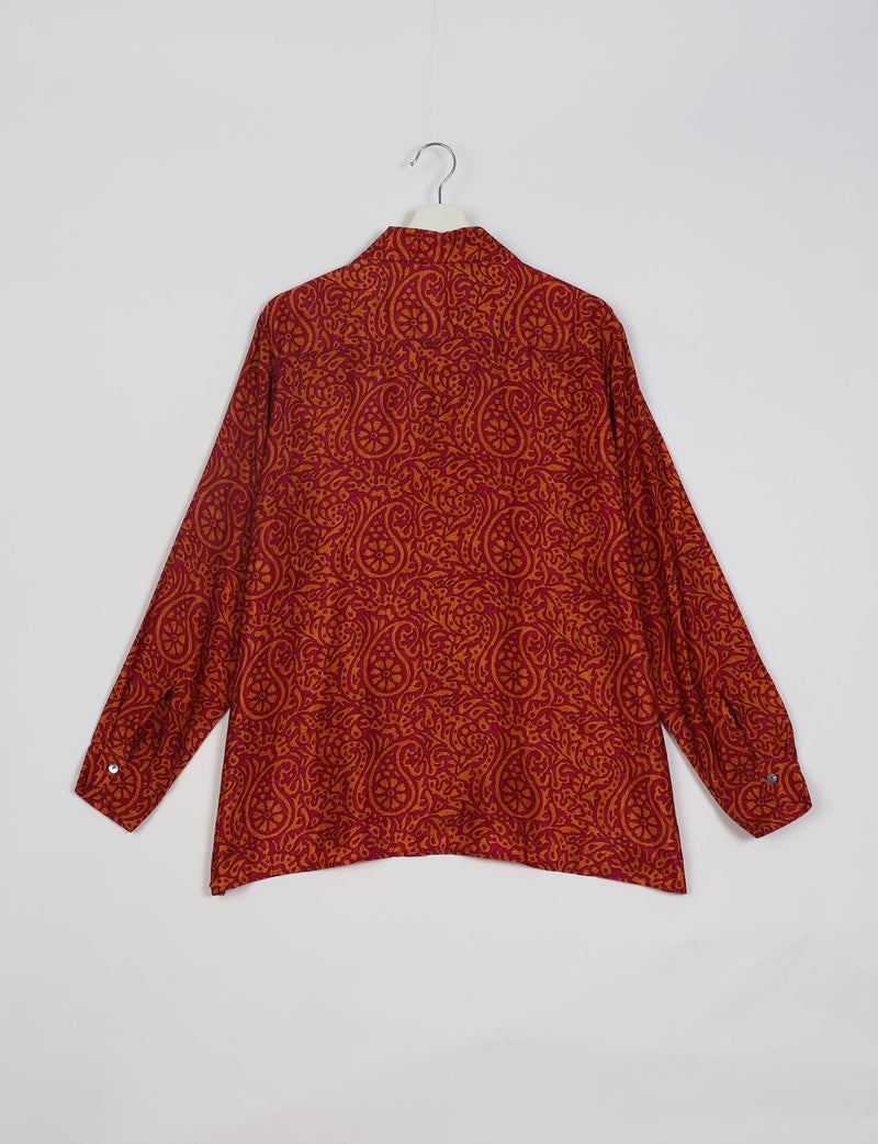 Red paisley patterned long-sleeve resort shirt shown from the back on a white hanger against a white background