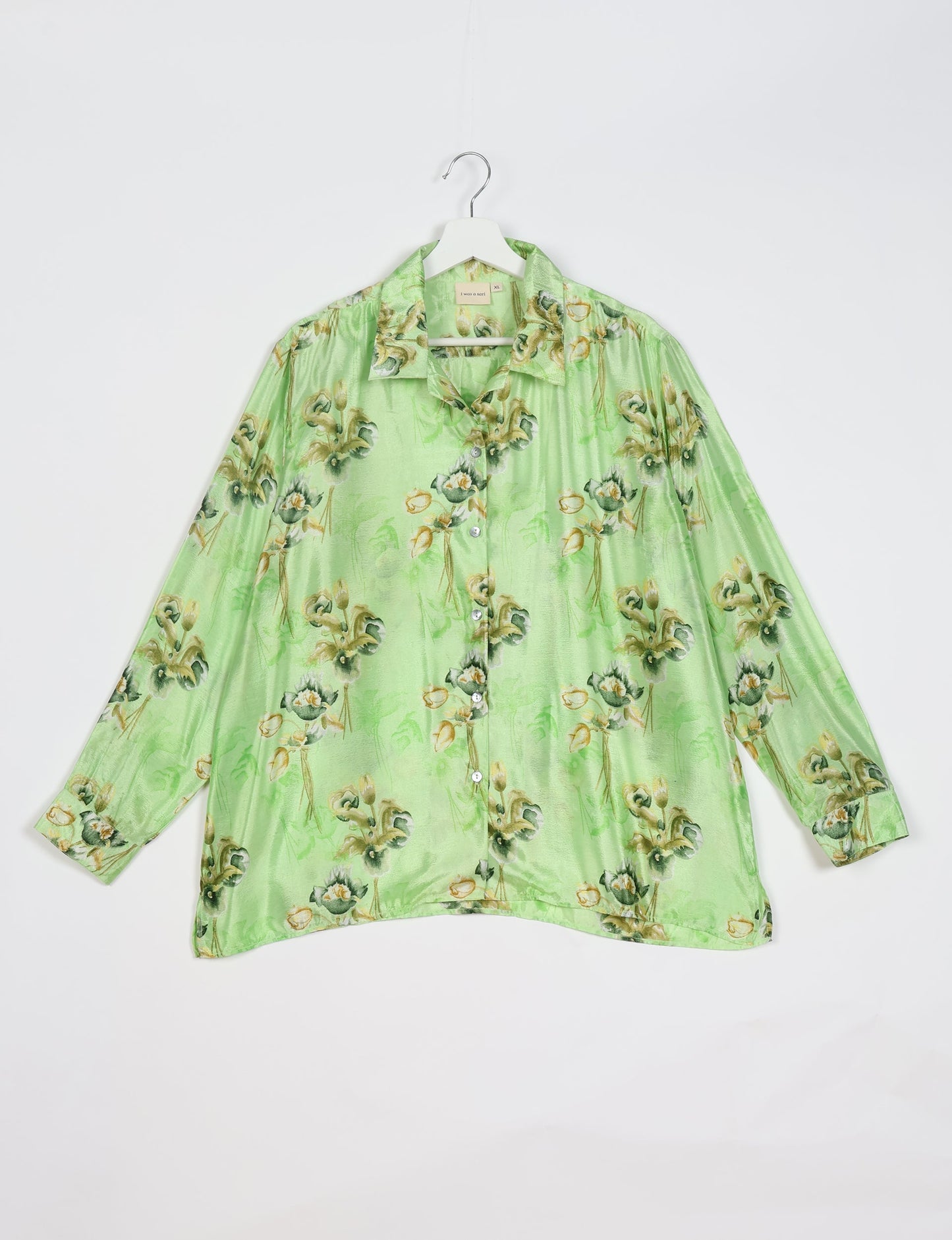 A person wearing a Resort Shirt, a sustainable fashion choice made from recycled materials.