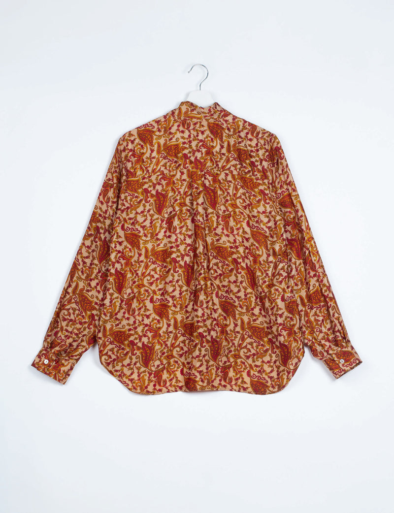 Long-sleeve shirt with orange and red abstract floral paisley pattern, shown from back on white hanger against white background