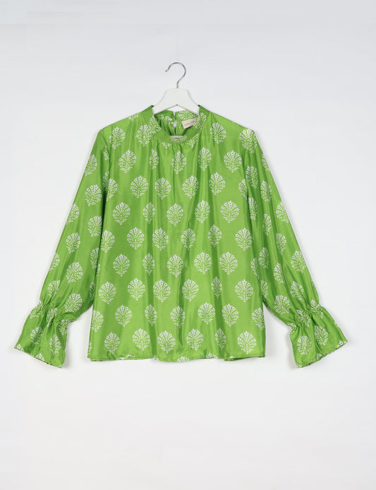 Flowing blouse with peasant sleeves and gathered neckline made from upcycled garments and repurposed clothing, showcasing eco clothing and fair trade fashion in a stylish, comfortable design.
