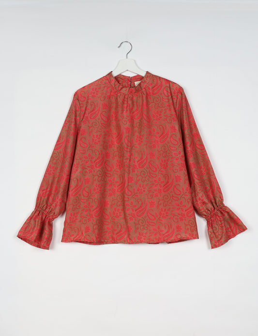 Flowing blouse with peasant sleeves and gathered neckline made from upcycled garments and repurposed clothing, showcasing eco clothing and fair trade fashion in a stylish, comfortable design.
