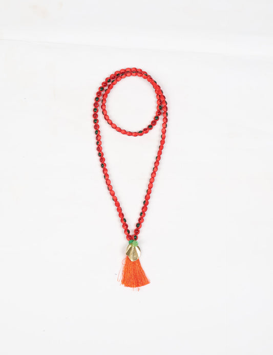 Discover elegance in our Beaded Tassel Necklace, meticulously handcrafted with glass beads, a silk tassel, and a metallic pendant. Hypoallergenic metal hooks provide a skin-friendly and stylish accessory. Length: 57 cm / 22.5 inches.