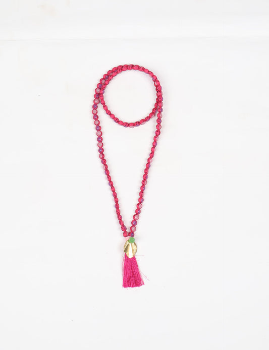 Discover elegance in our Beaded Tassel Necklace, meticulously handcrafted with glass beads, a silk tassel, and a metallic pendant. Hypoallergenic metal hooks provide a skin-friendly and stylish accessory. Length: 57 cm / 22.5 inches.