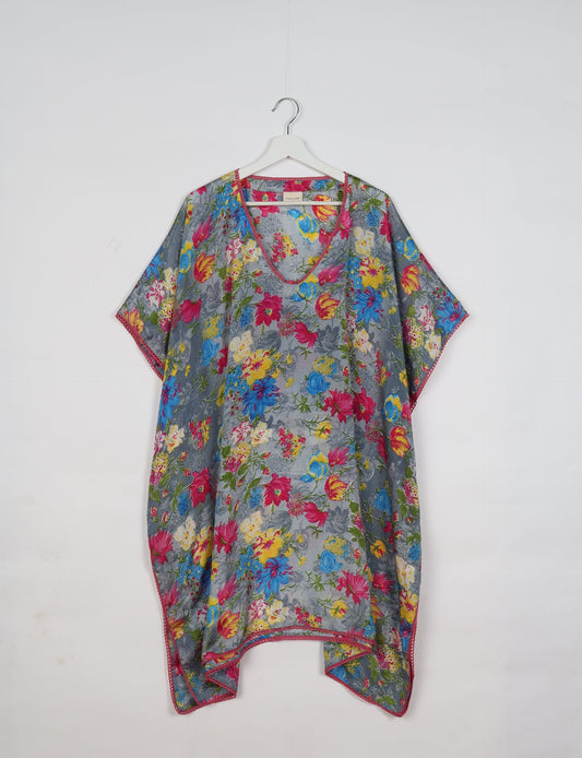 Embrace timeless elegance with our MIDI WRAP DRESS – a midi-length beauty featuring a v-neck, flattery from all angles, and a charming sari belt. Crafted from sustainable materials, this dress embodies ethical clothing and green fashion. Sophisticated with a frill tier at the hem and short cap sleeves, this dress is perfect for any occasion. Tie up the beautifully crafted sari belt on the side for a versatile, stylish, and eco-friendly look.