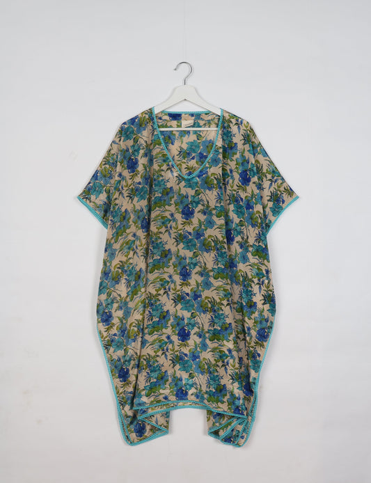 Embrace timeless elegance with our MIDI WRAP DRESS – a midi-length beauty featuring a v-neck, flattery from all angles, and a charming sari belt. Crafted from sustainable materials, this dress embodies ethical clothing and green fashion. Sophisticated with a frill tier at the hem and short cap sleeves, this dress is perfect for any occasion. Tie up the beautifully crafted sari belt on the side for a versatile, stylish, and eco-friendly look.