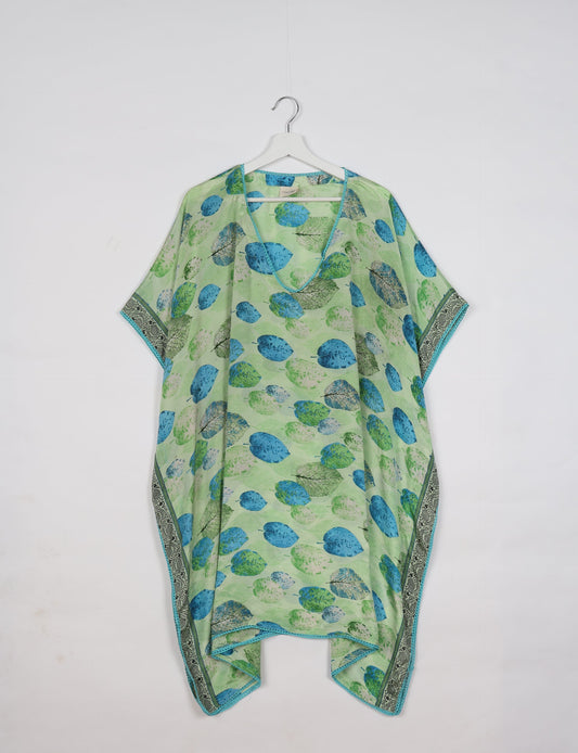 Embrace timeless elegance with our MIDI WRAP DRESS – a midi-length beauty featuring a v-neck, flattery from all angles, and a charming sari belt. Crafted from sustainable materials, this dress embodies ethical clothing and green fashion. Sophisticated with a frill tier at the hem and short cap sleeves, this dress is perfect for any occasion. Tie up the beautifully crafted sari belt on the side for a versatile, stylish, and eco-friendly look.