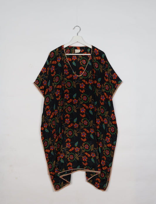 Embrace timeless elegance with our MIDI WRAP DRESS – a midi-length beauty featuring a v-neck, flattery from all angles, and a charming sari belt. Crafted from sustainable materials, this dress embodies ethical clothing and green fashion. Sophisticated with a frill tier at the hem and short cap sleeves, this dress is perfect for any occasion. Tie up the beautifully crafted sari belt on the side for a versatile, stylish, and eco-friendly look.