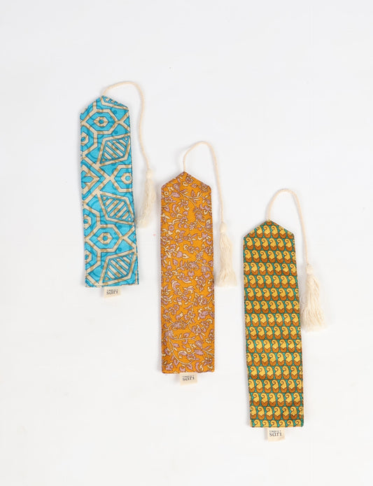 A chic Cloth Bookmark from BOOKMARK, made from upcycled garments, showcasing ethical fashion and sustainable practices. Perfect for elevating your reading experience while embracing zero waste clothing and slow fashion. Explore eco-friendly products crafted from recycled materials for an elegant touch to your favorite books.