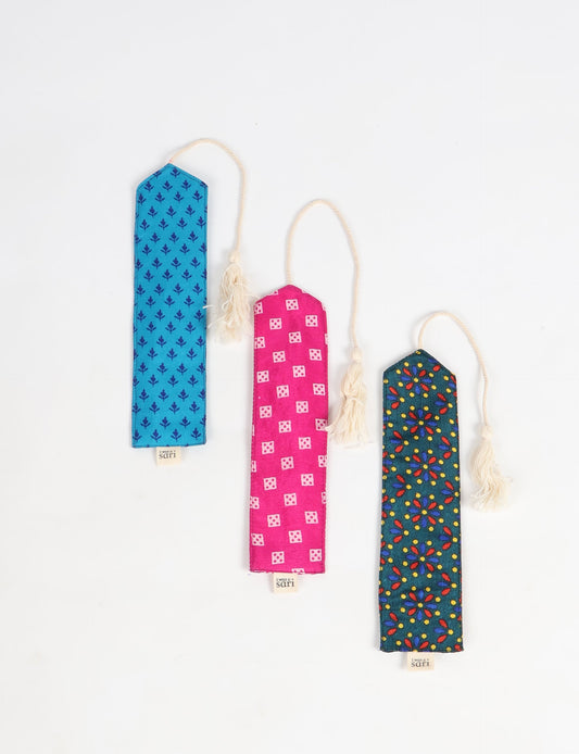 A chic Cloth Bookmark from BOOKMARK, made from upcycled garments, showcasing ethical fashion and sustainable practices. Perfect for elevating your reading experience while embracing zero waste clothing and slow fashion. Explore eco-friendly products crafted from recycled materials for an elegant touch to your favorite books.