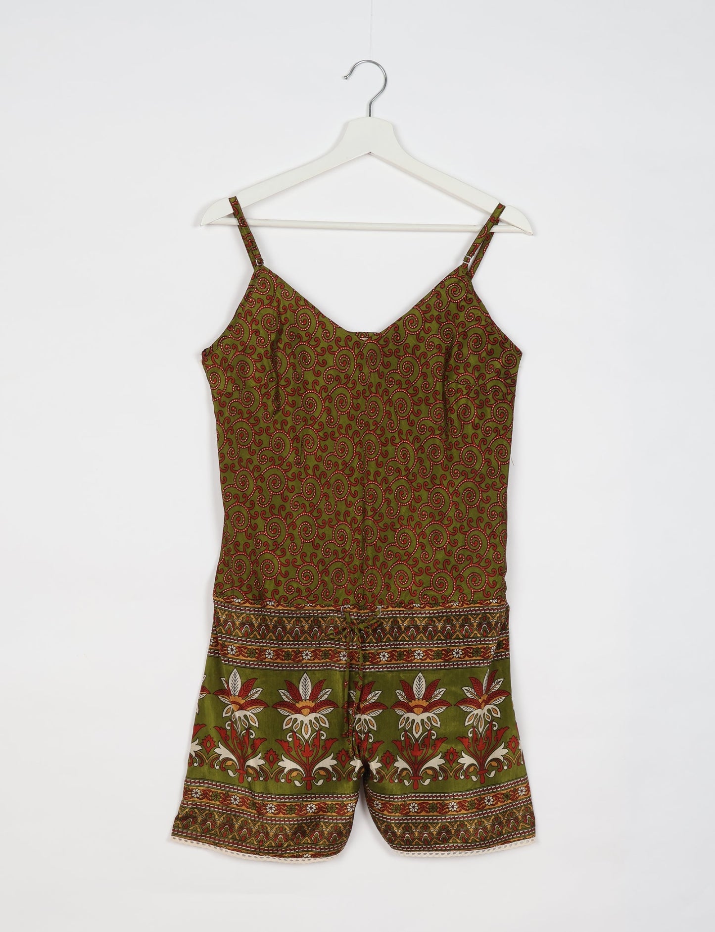 Vibrant playsuit with lace accents, crafted from upcycled saris. Embrace ethical fashion with this unique piece designed for conscious consumers.