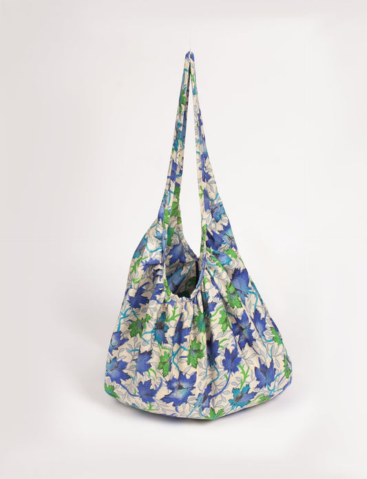 A stylish HOBO BAG made from recycled materials, perfect for eco-conscious fashionistas.