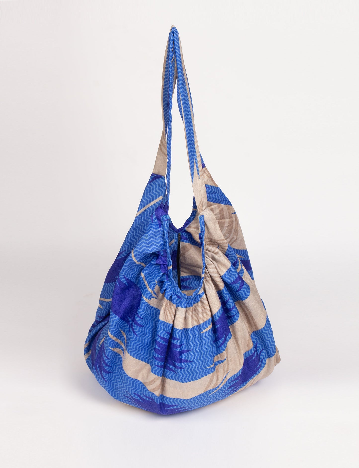 A stylish HOBO BAG made from recycled materials, perfect for eco-conscious fashionistas.