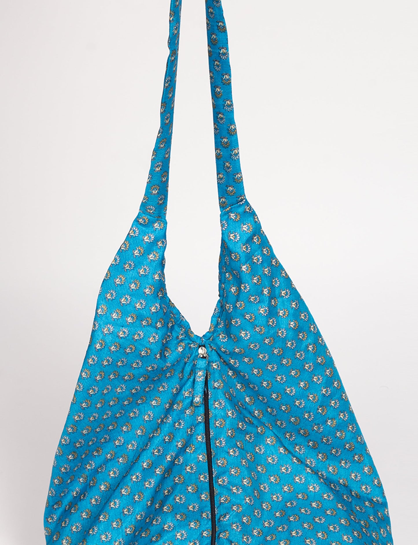 A stylish HOBO BAG made from recycled materials, perfect for eco-conscious fashionistas.