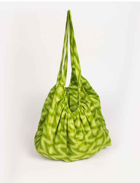 A stylish HOBO BAG made from recycled materials, perfect for eco-conscious fashionistas.