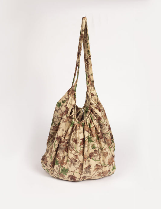 A stylish HOBO BAG made from recycled materials, perfect for eco-conscious fashionistas.