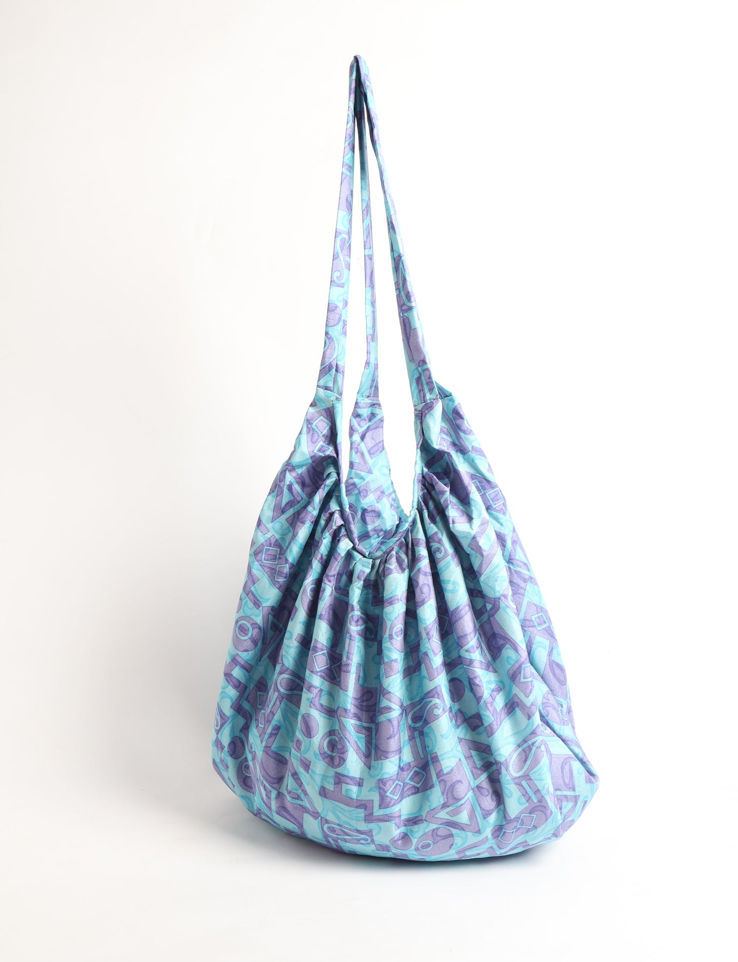 A stylish HOBO BAG made from recycled materials, perfect for eco-conscious fashionistas.