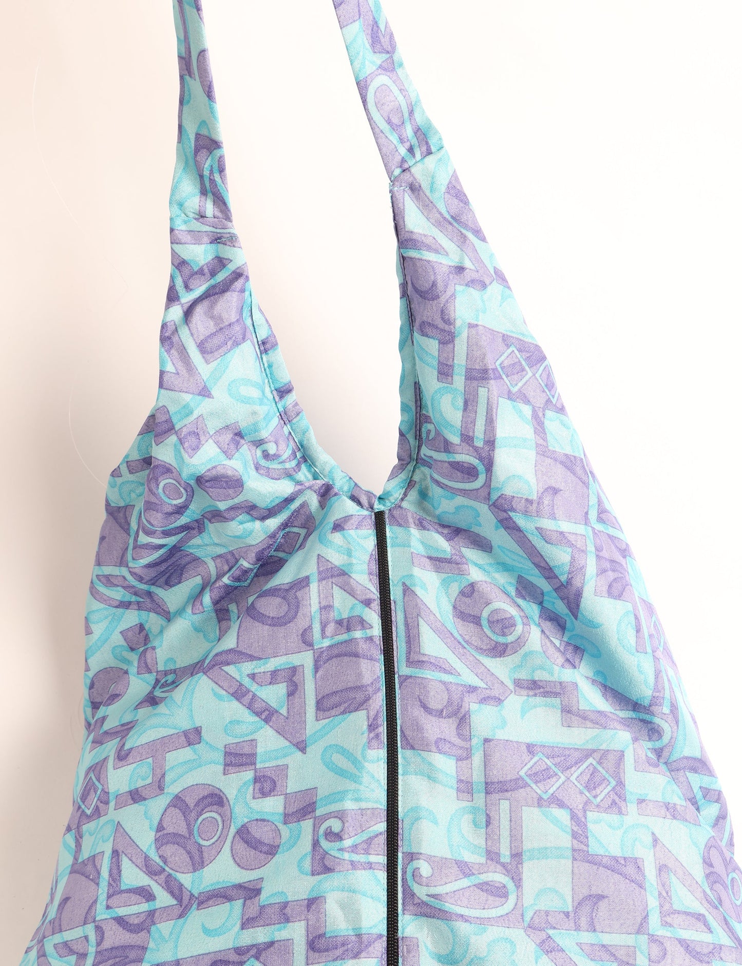 A stylish HOBO BAG made from recycled materials, perfect for eco-conscious fashionistas.