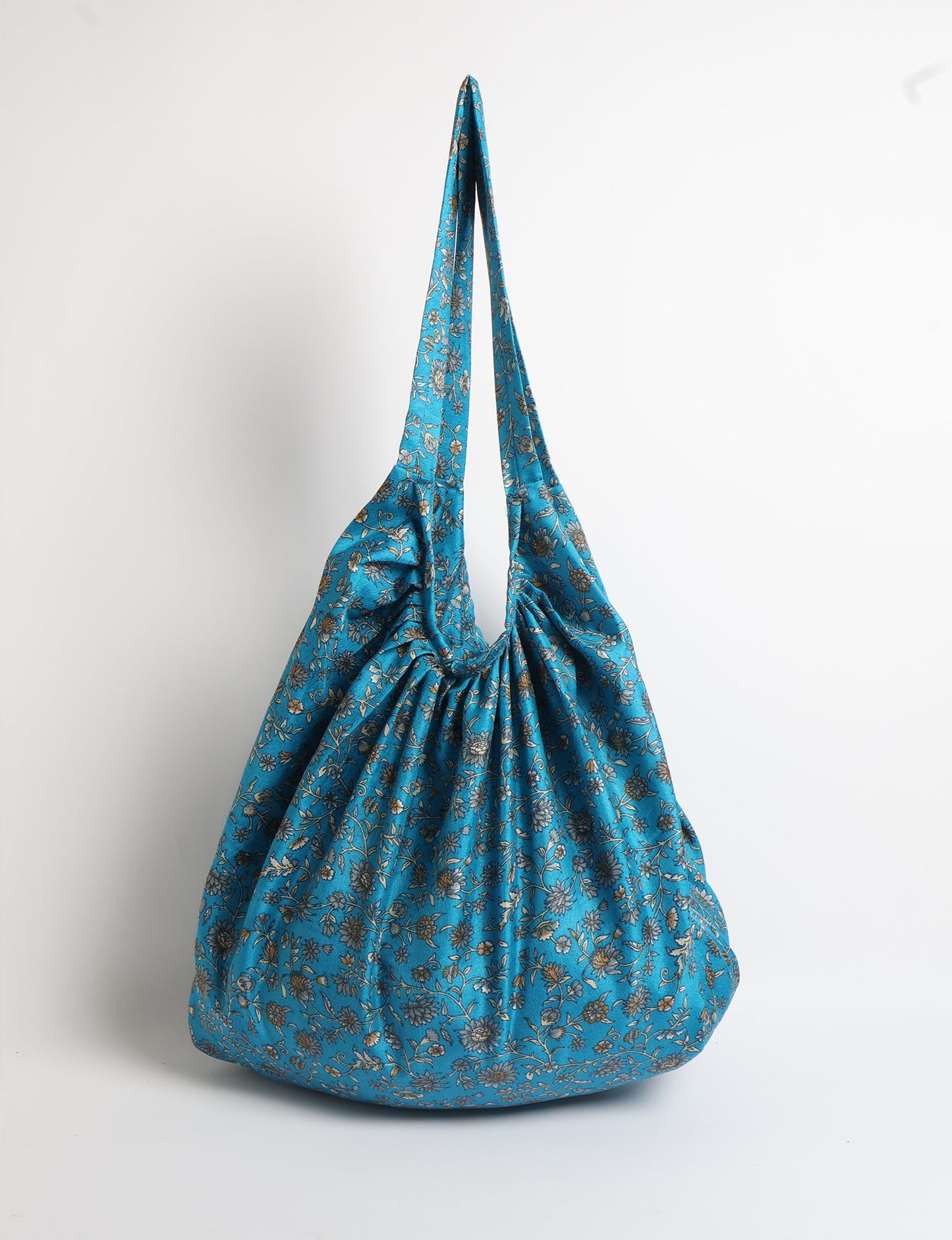 A stylish HOBO BAG made from recycled materials, perfect for eco-conscious fashionistas.