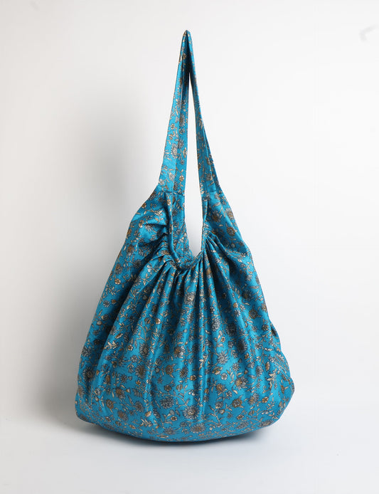 A stylish HOBO BAG made from recycled materials, perfect for eco-conscious fashionistas.