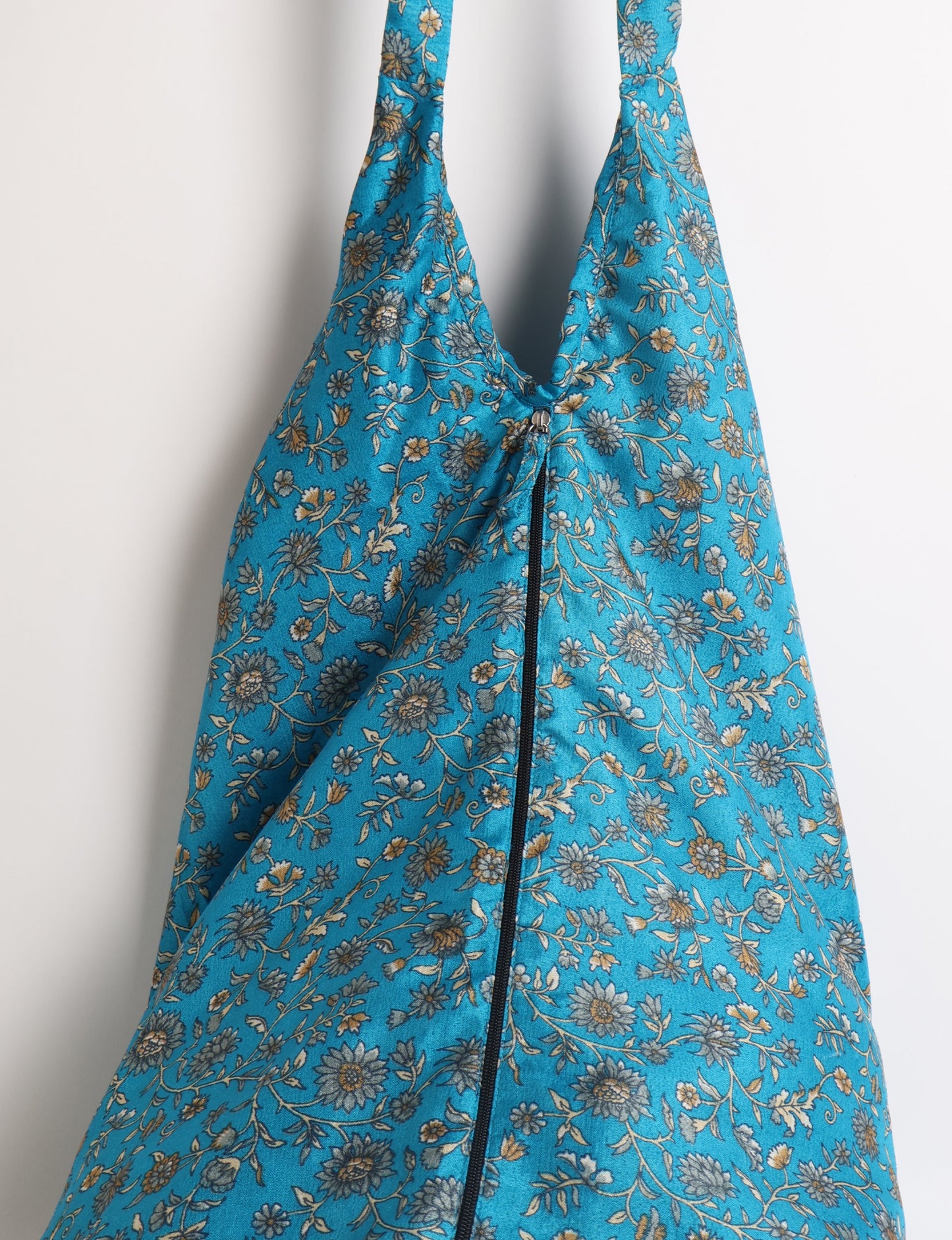 A stylish HOBO BAG made from recycled materials, perfect for eco-conscious fashionistas.