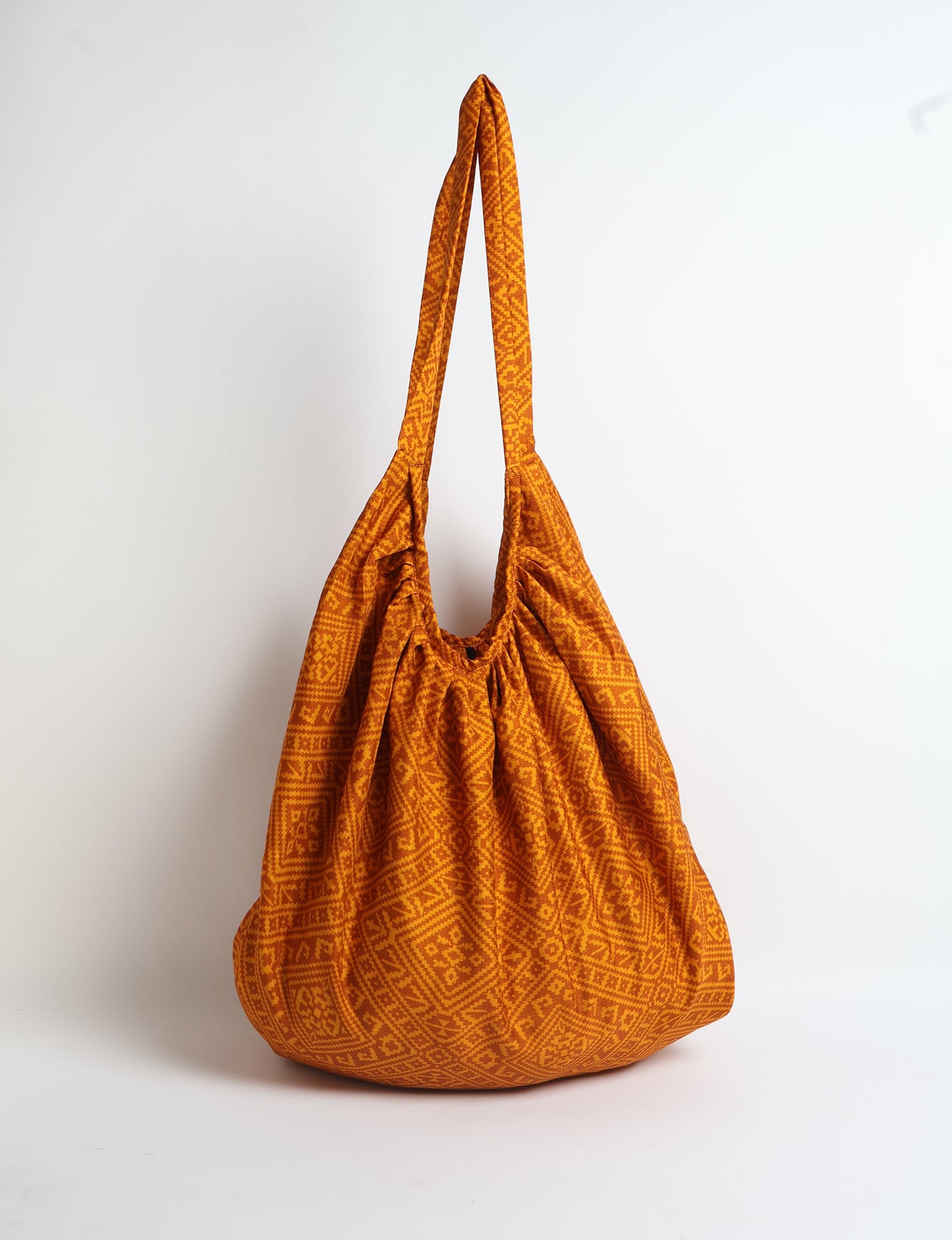 A stylish HOBO BAG made from recycled materials, perfect for eco-conscious fashionistas.