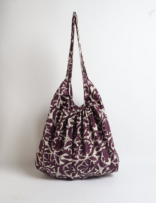 A stylish HOBO BAG made from recycled materials, perfect for eco-conscious fashionistas.