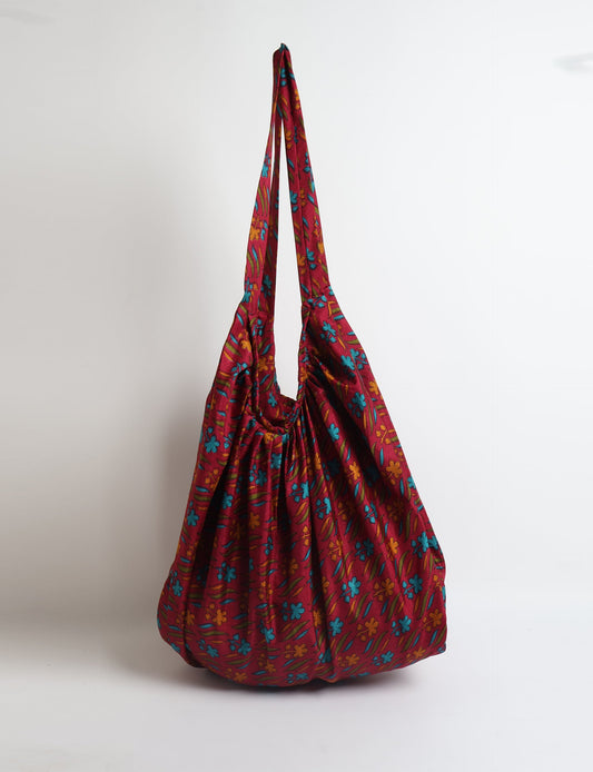 A stylish HOBO BAG made from recycled materials, perfect for eco-conscious fashionistas.