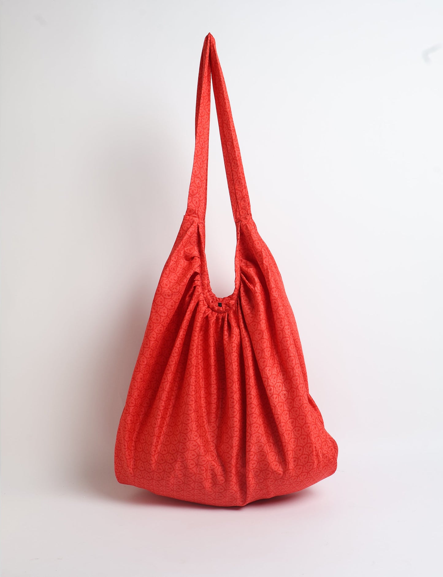 A stylish HOBO BAG made from recycled materials, perfect for eco-conscious fashionistas.